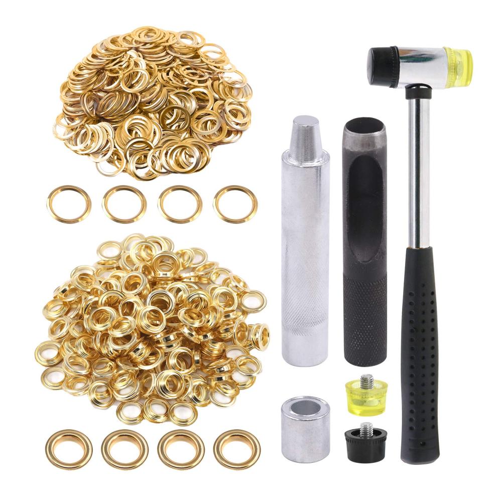 Goldene Ösen mit Werkzeug